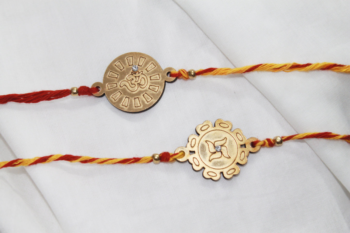 Set of 2 - OM & Swastik MDF Eco Rakhi Avante Meraki