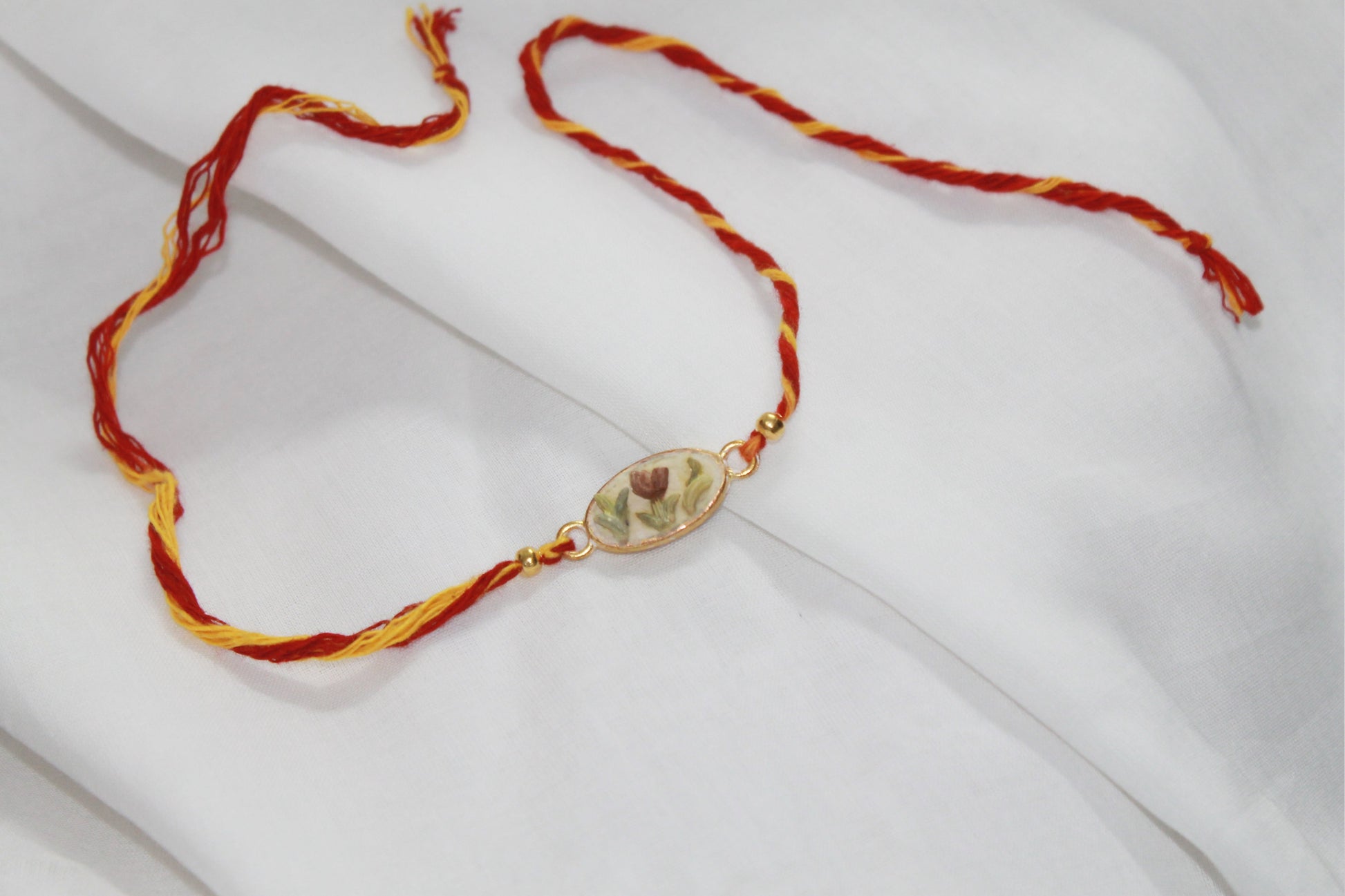 Oval Seed Decor Eco-Luxury Rakhi Avante Meraki