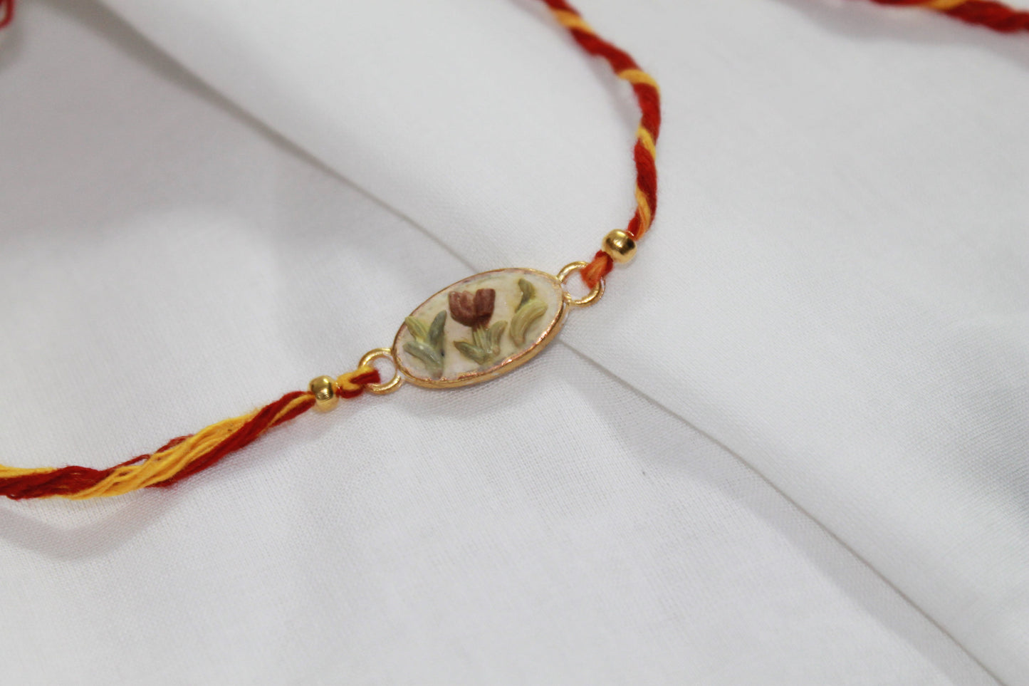 Oval Seed Decor Eco-Luxury Rakhi Avante Meraki