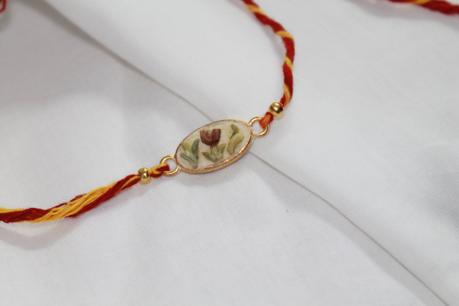 Oval Seed Decor Eco-Luxury Rakhi Avante Meraki
