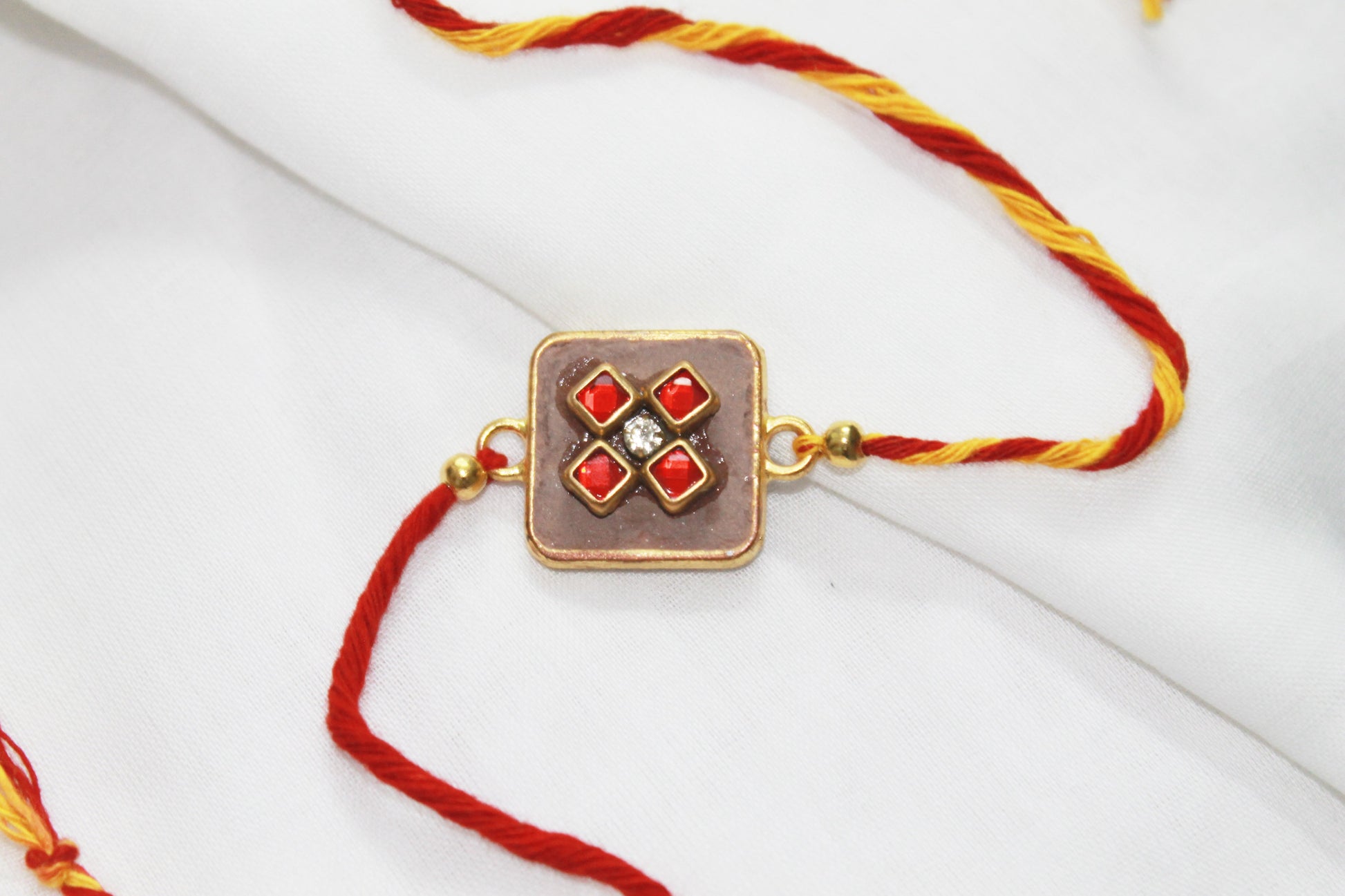 Square Teracotta-Kundan Eco-Luxury Rakhi Avante Meraki