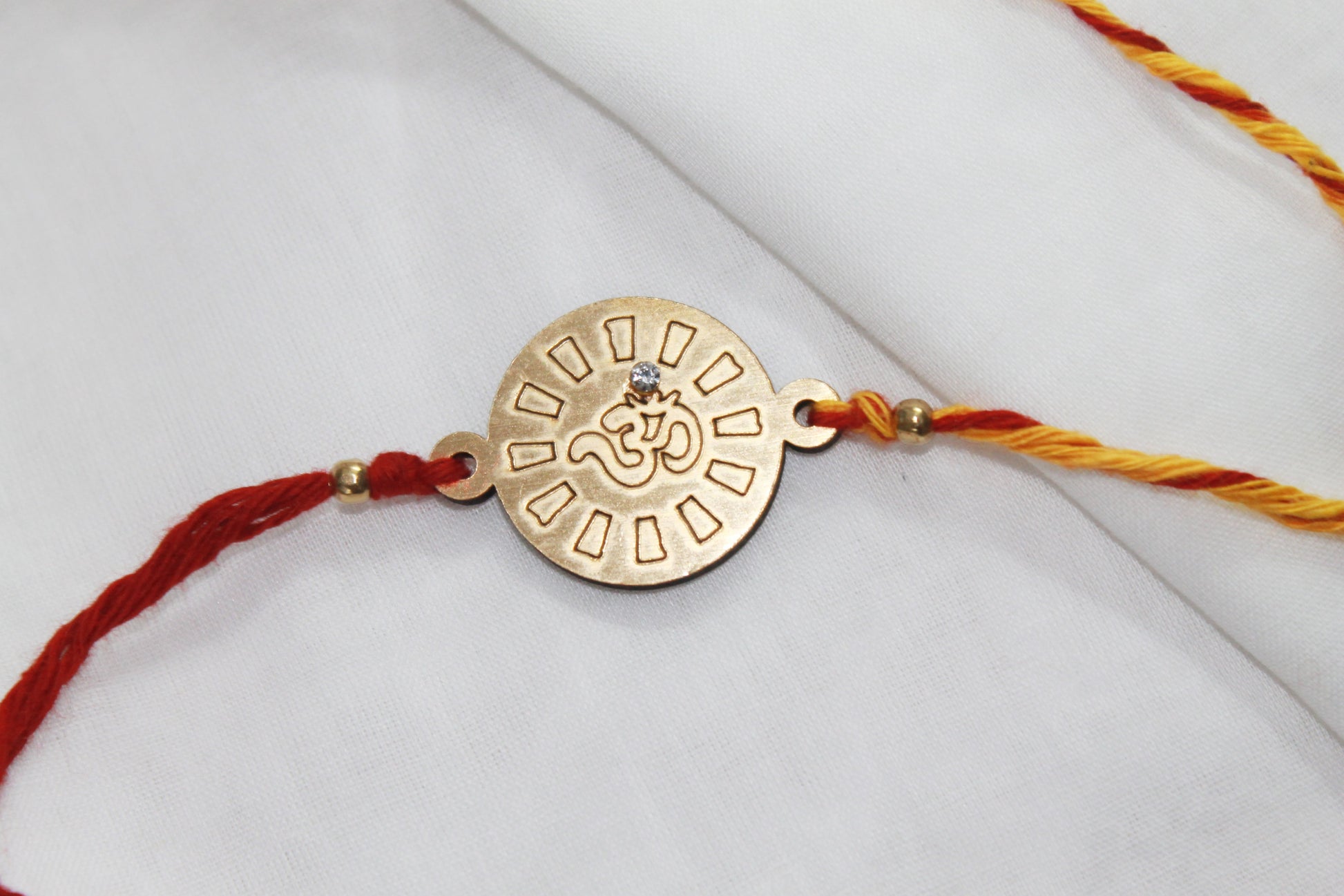 Set of 2  - OM & Swastik MDF Eco Rakhi Avante Meraki