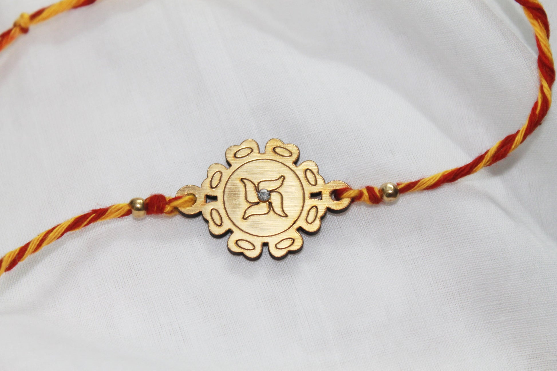 Set of 2  - OM & Swastik MDF Eco Rakhi Avante Meraki